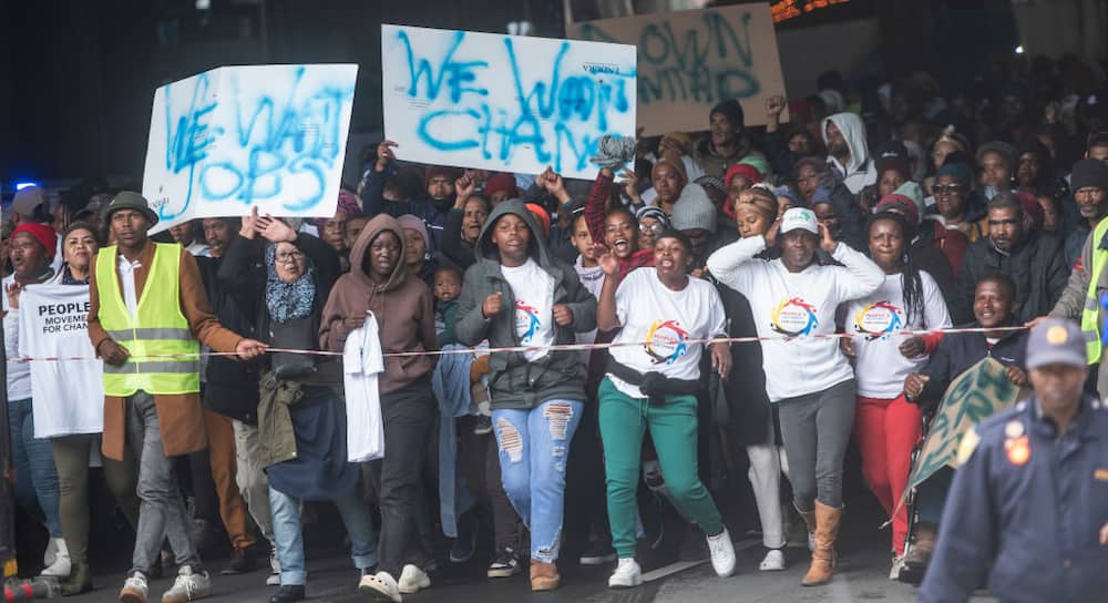 A group of young people marching for employment demand to be given jobs