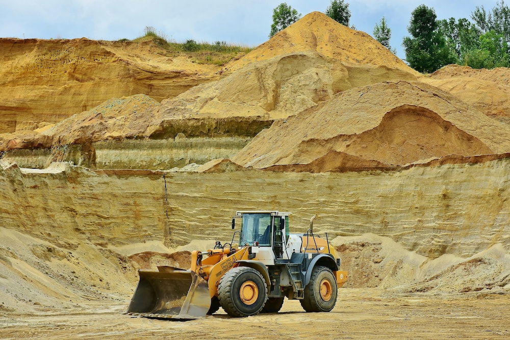 A front-end loader in a mining site