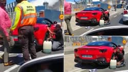 Video of posh Ferrari running out of petrol, stuck on roadside stuns SA: "Embarrassing"