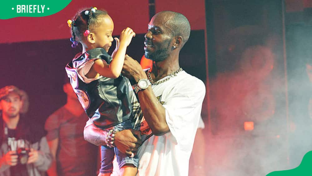 DMX on stage with daughter Aaliyah on stage