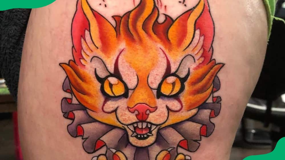 Firing cat tattoo