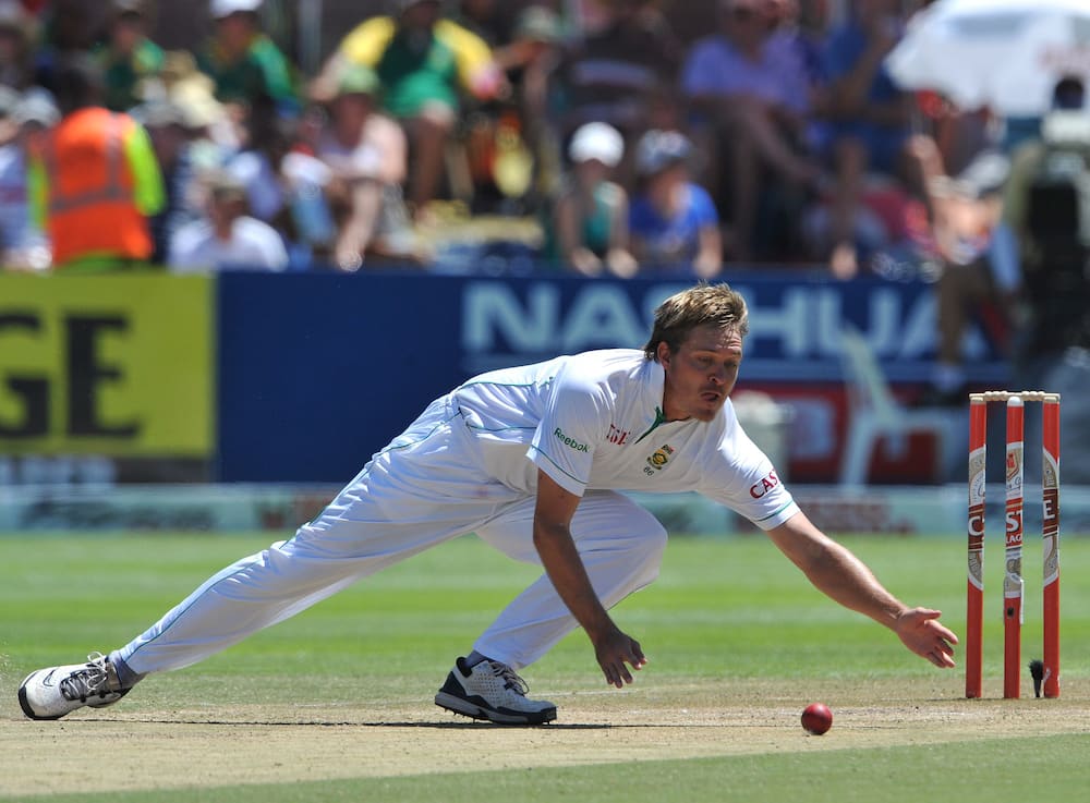 Paul Harris fields off his own bowling during 3rd Test match between SA and India at Newlands Stadium on 4 January 2011.