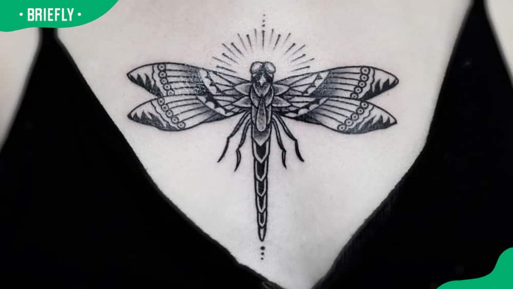 Illuminating dragonfly tattoo