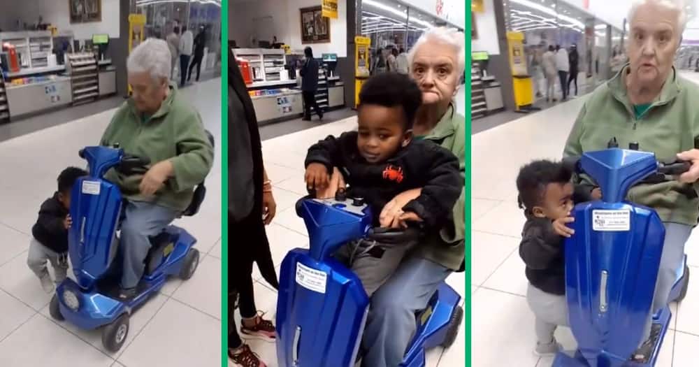 Little boy catches a lift with elderly lady