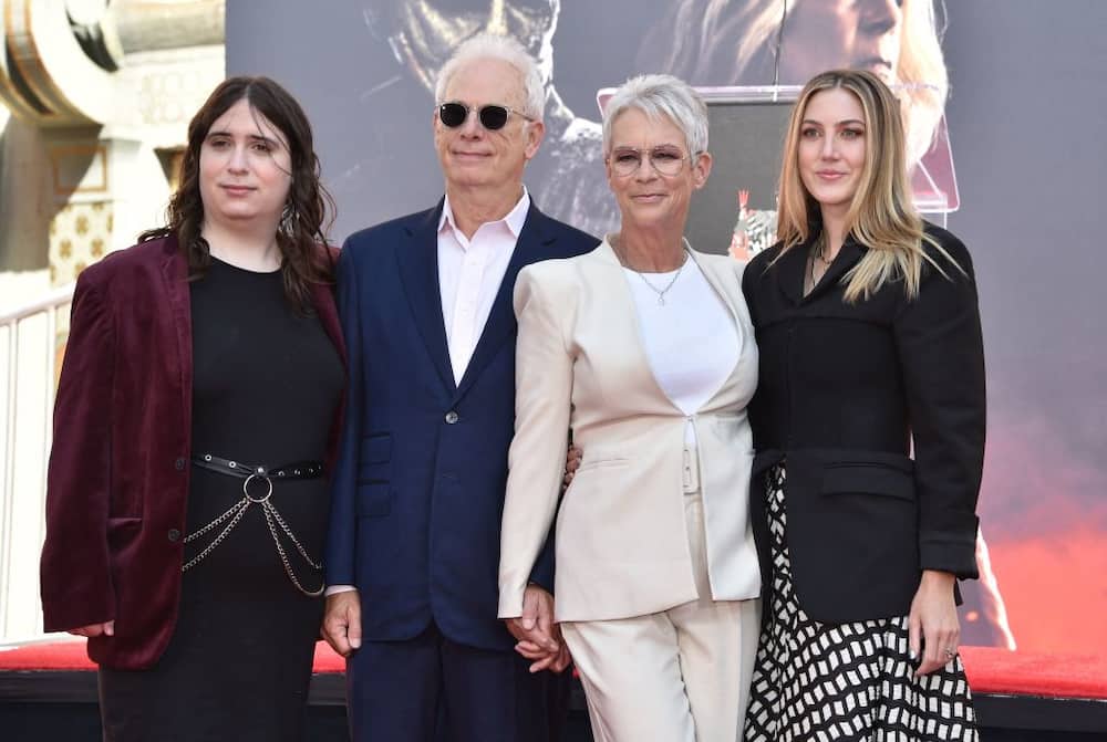 Jamie Lee (2nd right) with her husband Christopher Guest, and daughters Ruby (left) and Annie (right) during her hand and footprint ceremony in the courtyard of the TCL Chinese theatre.
