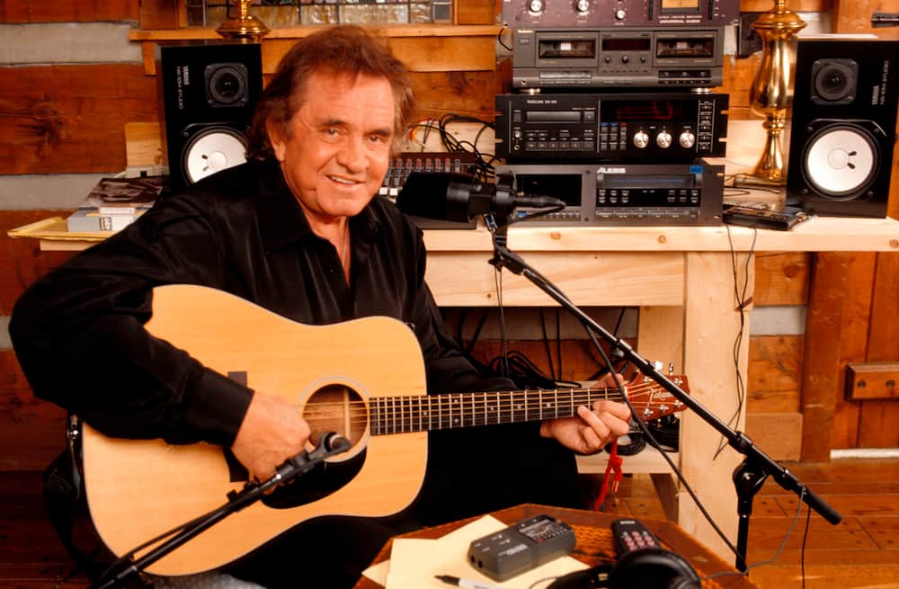 Country singer Johnny Cash at a home recording studio
