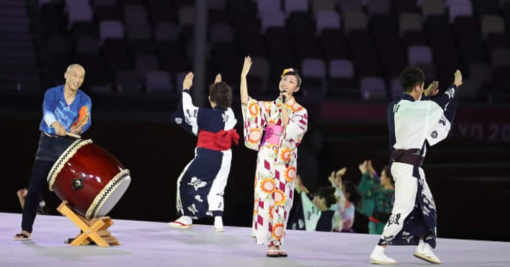 A singer during the Closing Ceremony on day sixteen of the Tokyo 2020 Olympic Games at Olympic Stadium on August 8, 2021 in Tokyo, Japan. (Photo by Jean Catuffe/Getty Images).