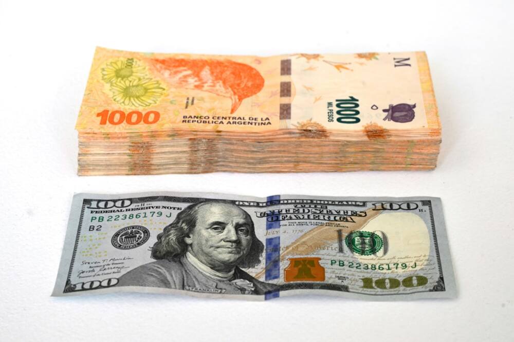 The equivalent of 100 US dollars is seen in Argentine pesos The equivalent of 100 US dollars is seen in Argentine pesos