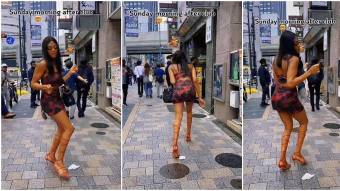 Tall beautiful lady in heels and short dress dances hard with her waist on a Japan road, stuns people in video