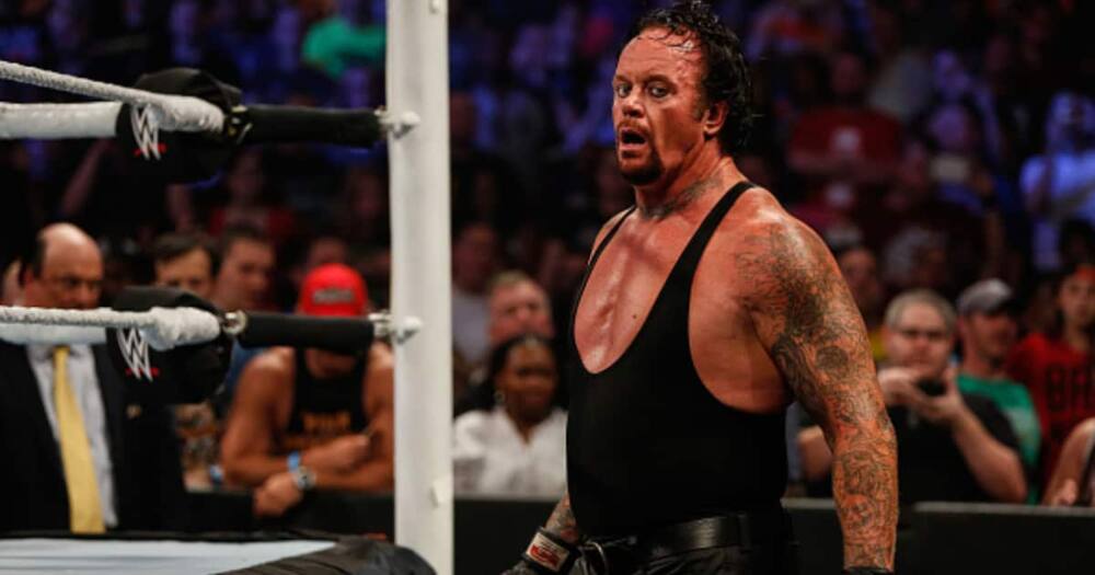 The Undertaker recovers during his fight against Brock Lesner at the WWE SummerSlam 2015 at Barclays Center of Brooklyn on August 23, 2015 in New York City. (Photo by JP Yim/Getty Images)