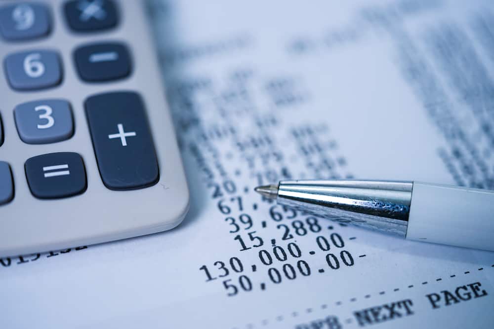An individual doing financial statement reconciliation