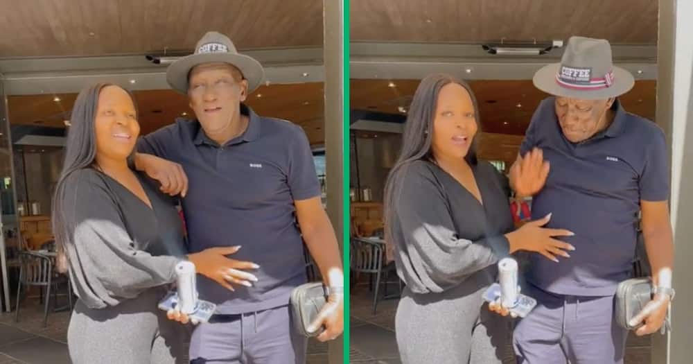 A woman was touchy-feely with Minister of Police Bheki Cele
