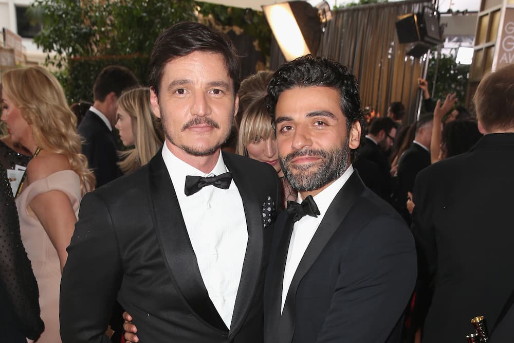Pedro Pascal and Oscar Isaac at the Golden Globes