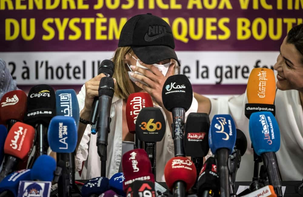 An accuser reacts during a press conference organised by the Moroccan Association for the Rights of Victims in Tangiers on June 17, 2022, regarding the case of French tycoon Jacques Bouthier