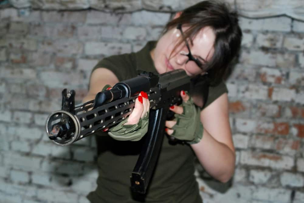Some women in southeastern Ukraine's Zaporizhzhia are learning how to use Kalashnikov assault rifles as part of an urban combat training programme