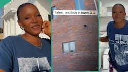 "Latest landlady": Nigerian lady celebrates after building new house, shares video of big mansion