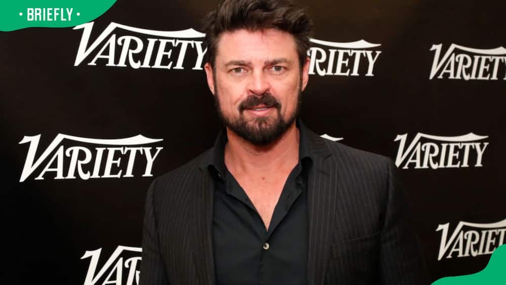 Karl Urban posing for a photo at the Variety Studio in 2022