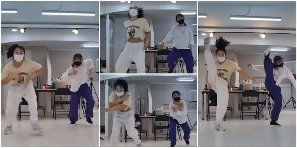Pretty Korean ladies do quick leg movements as they dance legwork in thrilling video