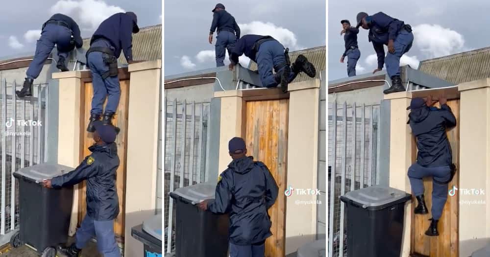 Footage of SAPS officers climbing a wall