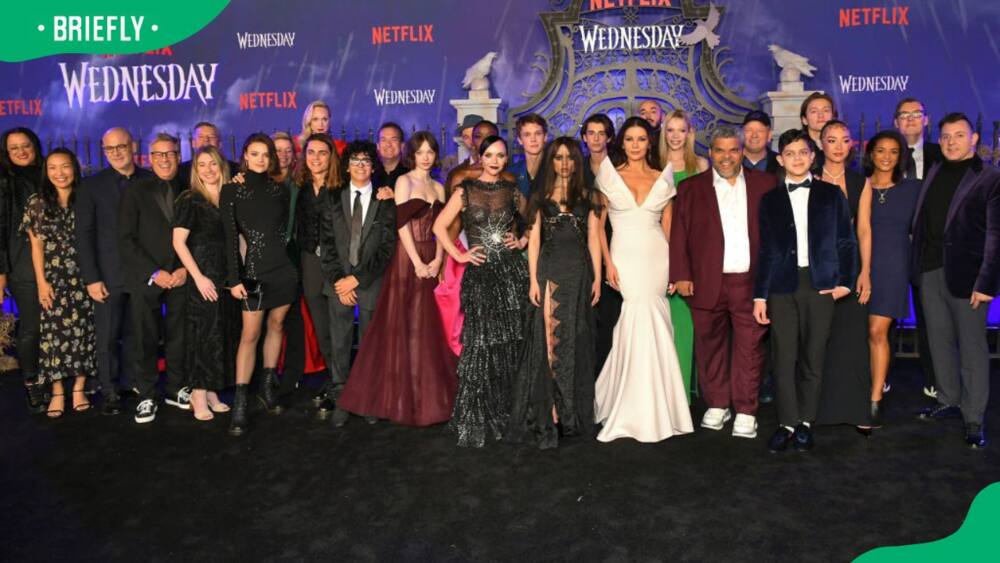 Wednesday's cast members during its world premiere in 2022