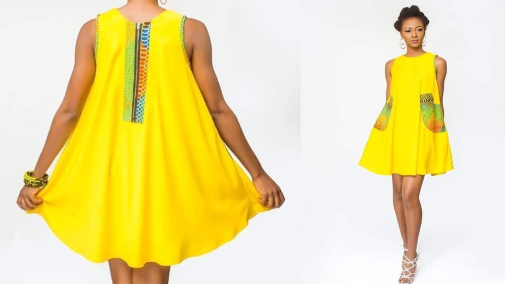 Yellow shift dress with African print details