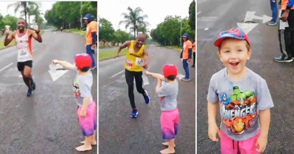A little boy hands out water packs to runners and has an adorable reaction when one runner finally takes water from him.