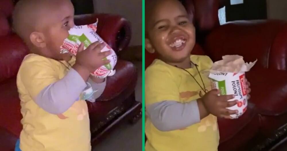 An adorable toddler wolfed down a roll of polony