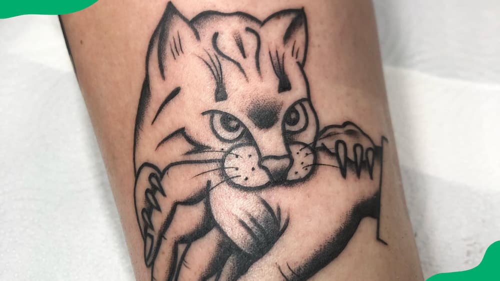 Bite cat tattoo