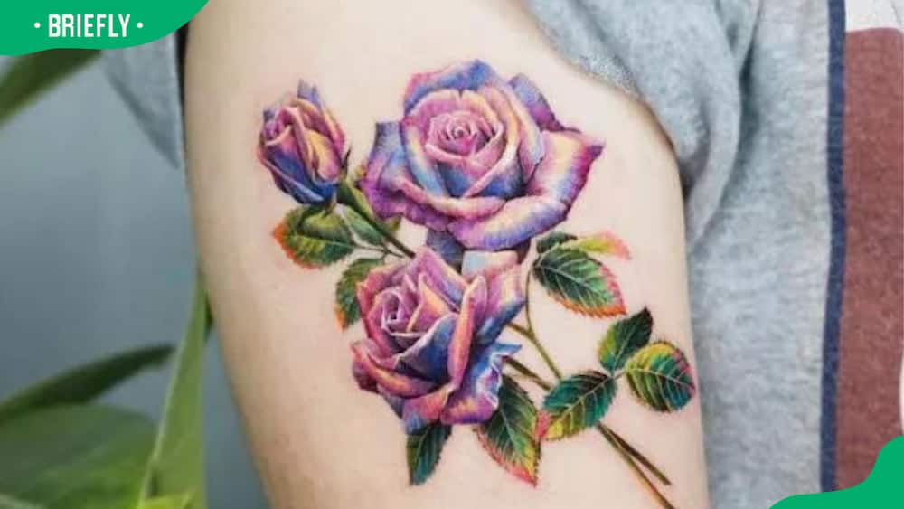 Iridescent rose tattoo