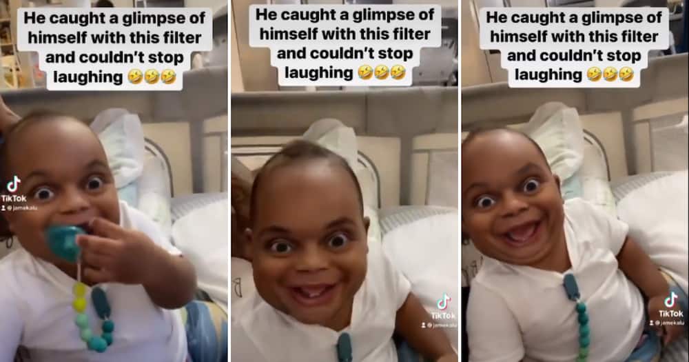 Baby laughing at himself