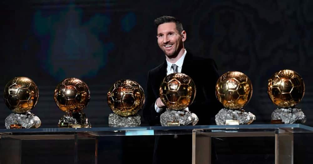 Lionel Messi poses onstage after winning his sixth Ballon D'Or award at Theatre Du Chatelet in December 2019. Photo by Kristy Sparow/Getty Images.