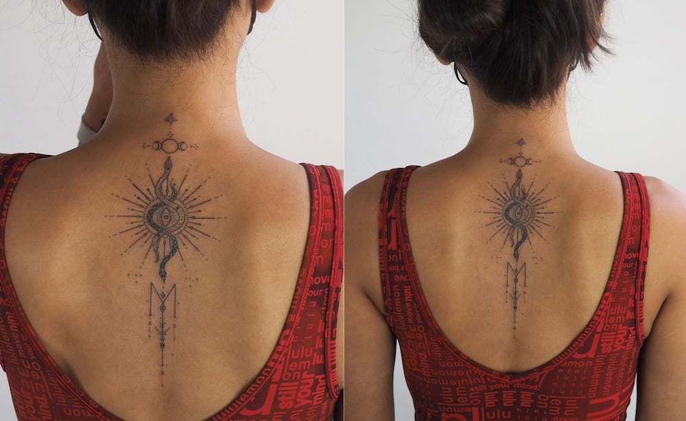 Snake and sun tattoo