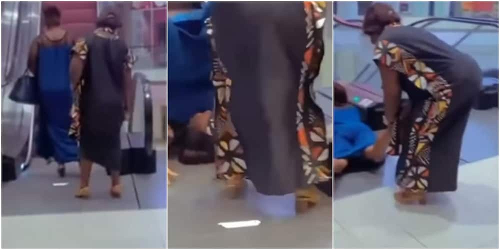 Woman falls, escalator, video