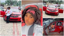 Young Lady buys stunning new red Toyota car, peeps celebrate her but haters question her source of income