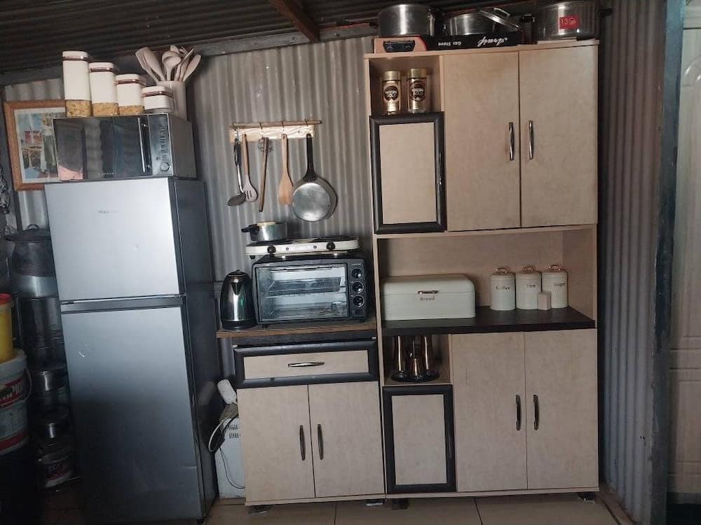Johannesburg lady shows off her impressive fully furnished kitchen.