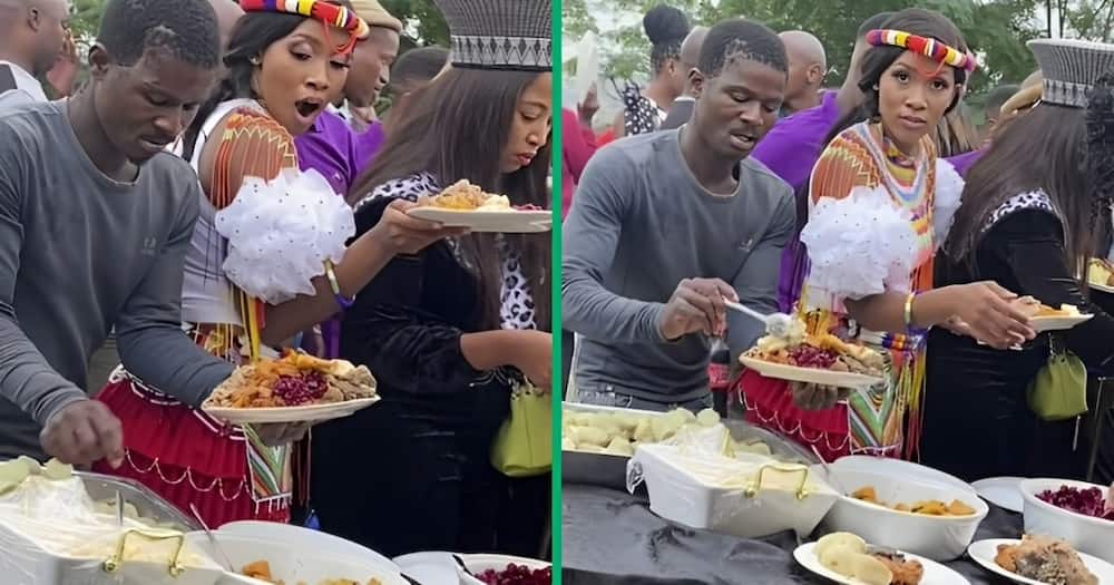 A man dishing out food at an event stunned people