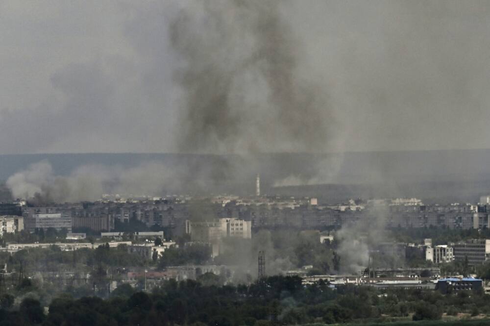 Smoke and dirt rise from the industiral city of Severodonetsk on Friday, where fighting has raged for weeks