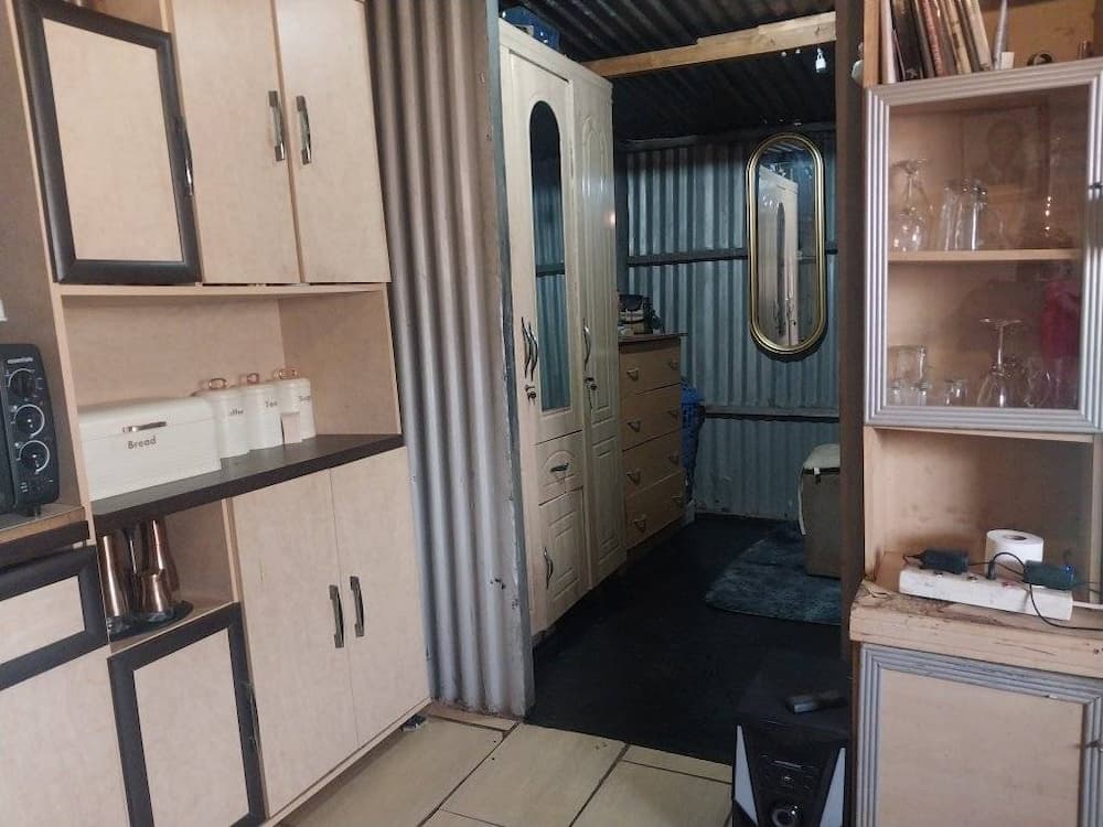 Johannesburg woman shows off impressive photos of her shack.