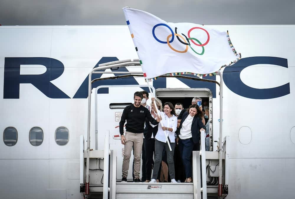 Paris mayor Anne Hidalgo, a flag-waver for social businesses and the Olympics, brought Yunus on board