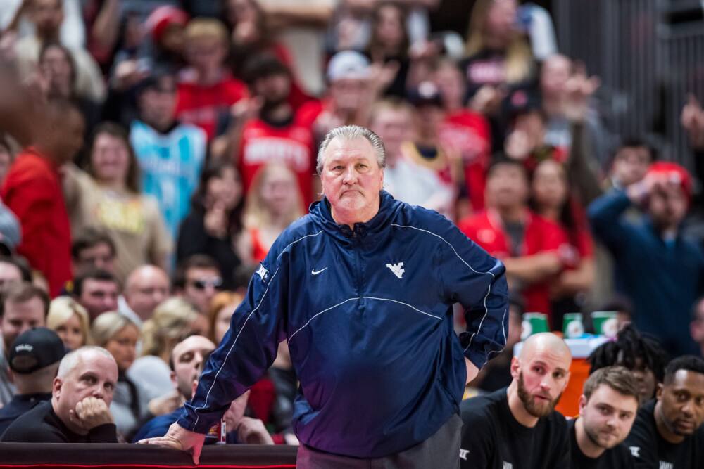 Bob Huggins of the West Virginia Mountaineers stands on the sideline during a game