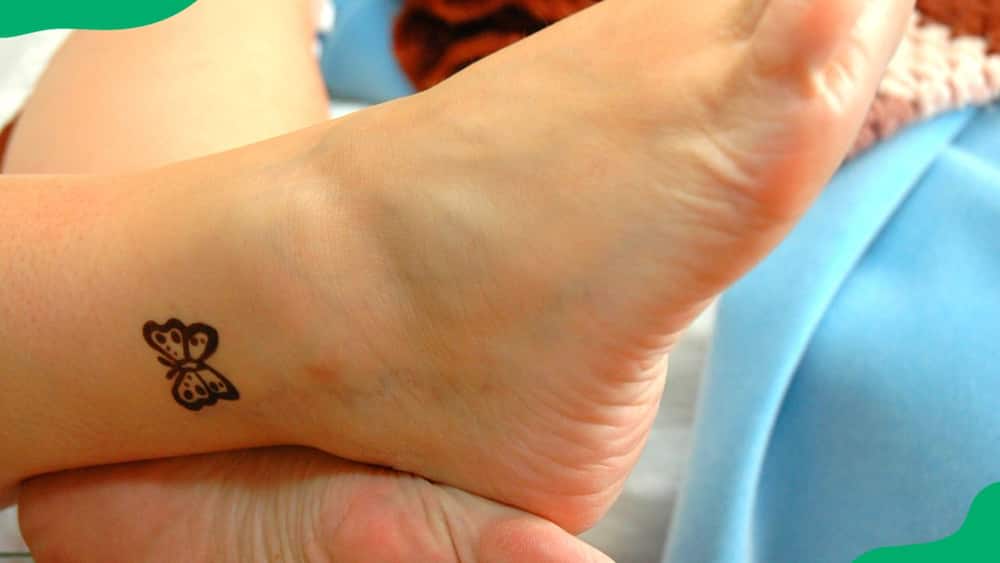 Wrap-around ankle tattoo