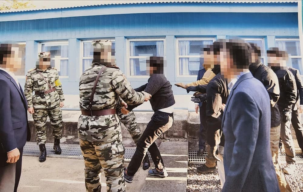 Photos of the controversial 2019 repatriation were released by South Korea's new government