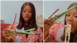 Internet users appalled over video of lady eating with extralong artificial nails